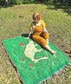 Cat in the grass festival blanket by Posse Paper Goods